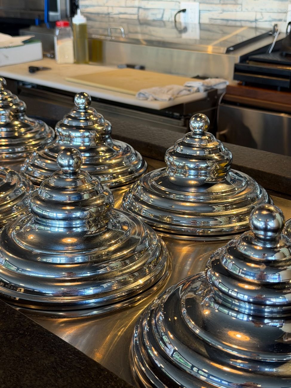 Glass domes on the counter inside the shop